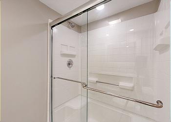 En-suite Guest Bathroom with Tub and Shower Combination