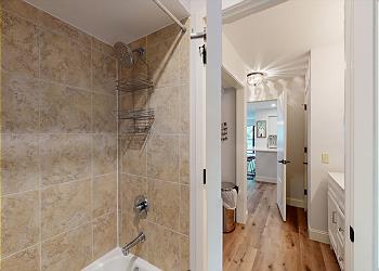 En-Suite Bathroom with Tub and Shower Combination