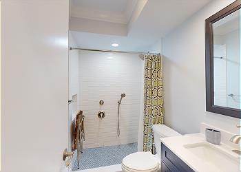 First Floor Guest Bathroom with Tiled Walk-in Shower