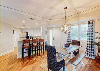 Open Floor Plan Dining Room with Kitchen Views and Counter Seati
