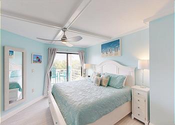 Primary Bedroom with Access to Private Balcony