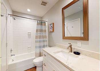 Guest Bathroom with Tub and Shower Combination
