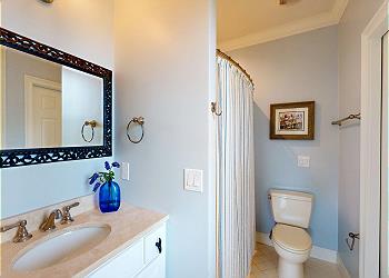 En-suite Guest Bathroom with Tub and Shower Combination