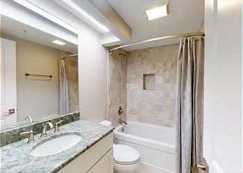 Twin Hall Bathroom with Combo Tub Shower/Tub