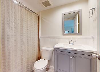 En-Suite Bathroom with Tub and Shower Combination