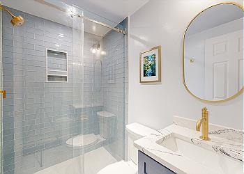 Newly Renovated Bathroom with Tiled Walk-in Shower