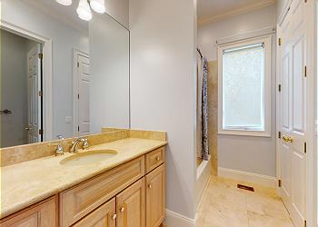 En-Suite Bathroom with Tub and Shower Combination