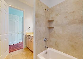 En-Suite Bathroom with Tub and Shower Combination