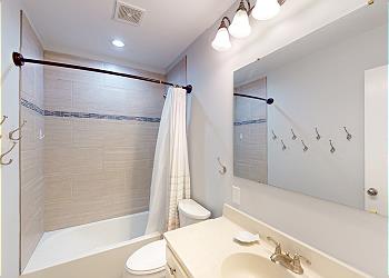 Guest Bathroom with Tub and Shower Combination