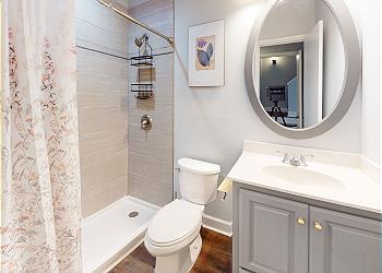 First Floor Guest Bathroom with Tiled Walk-in Shower