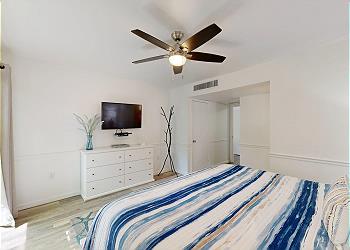 First Floor Primary Bedroom with HDTV