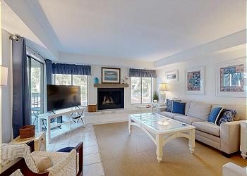 Living Room with View of the Fazio Community Pool