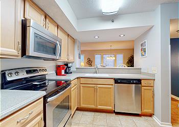 Fully Stocked Kitchen with Pass-Through Window