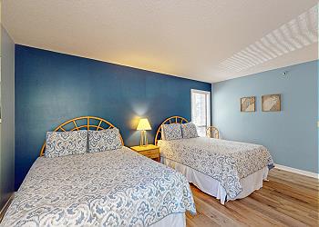 Bedroom 1 with Two Queen Size Beds