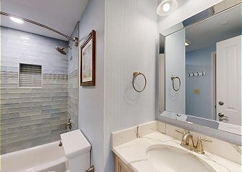 Shared Guest Bathroom with Tub and Shower Combination