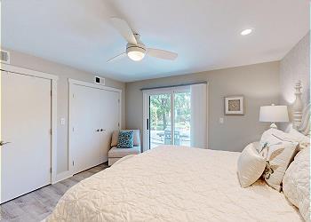 Primary Bedroom with His and Hers Closet