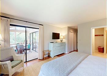 Primary Bedroom with Direct Access to Screened-in Porch