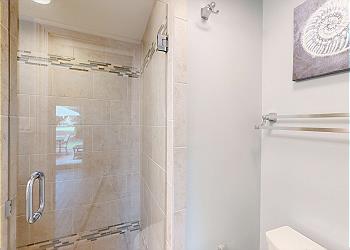 Shared Guest Bathroom with Tiled Walk-in Shower