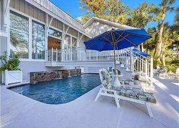 Pool with Elevated Waterfall and Walkover Bridge