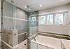 Primary Bathroom with Tiled Walk-in Shower