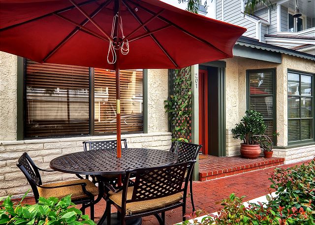 Cozy outdoor patio complete with a gas BBQ and patio furniture