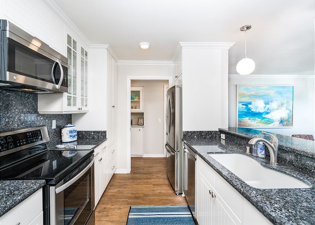 This oceanfront condo features a full-kitchen