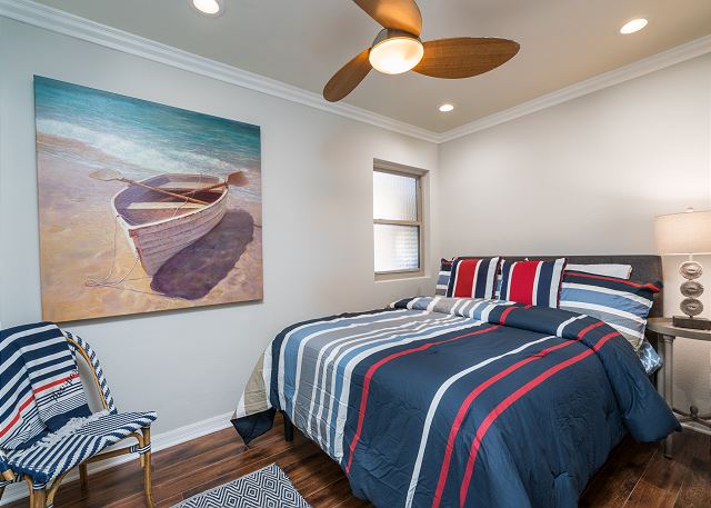 The third bedroom has a queen bed
