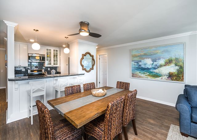 Open concept dining, kitchen and living area