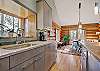 Additional view of well-equipped kitchen into the dining area - 10 Southface - Breckenridge Vacation Rental