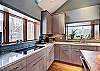 Clean and modern, this kitchen is the ideal place to whip up a snack or full meal - 10 Southface -Breckenridge Vacation Rental