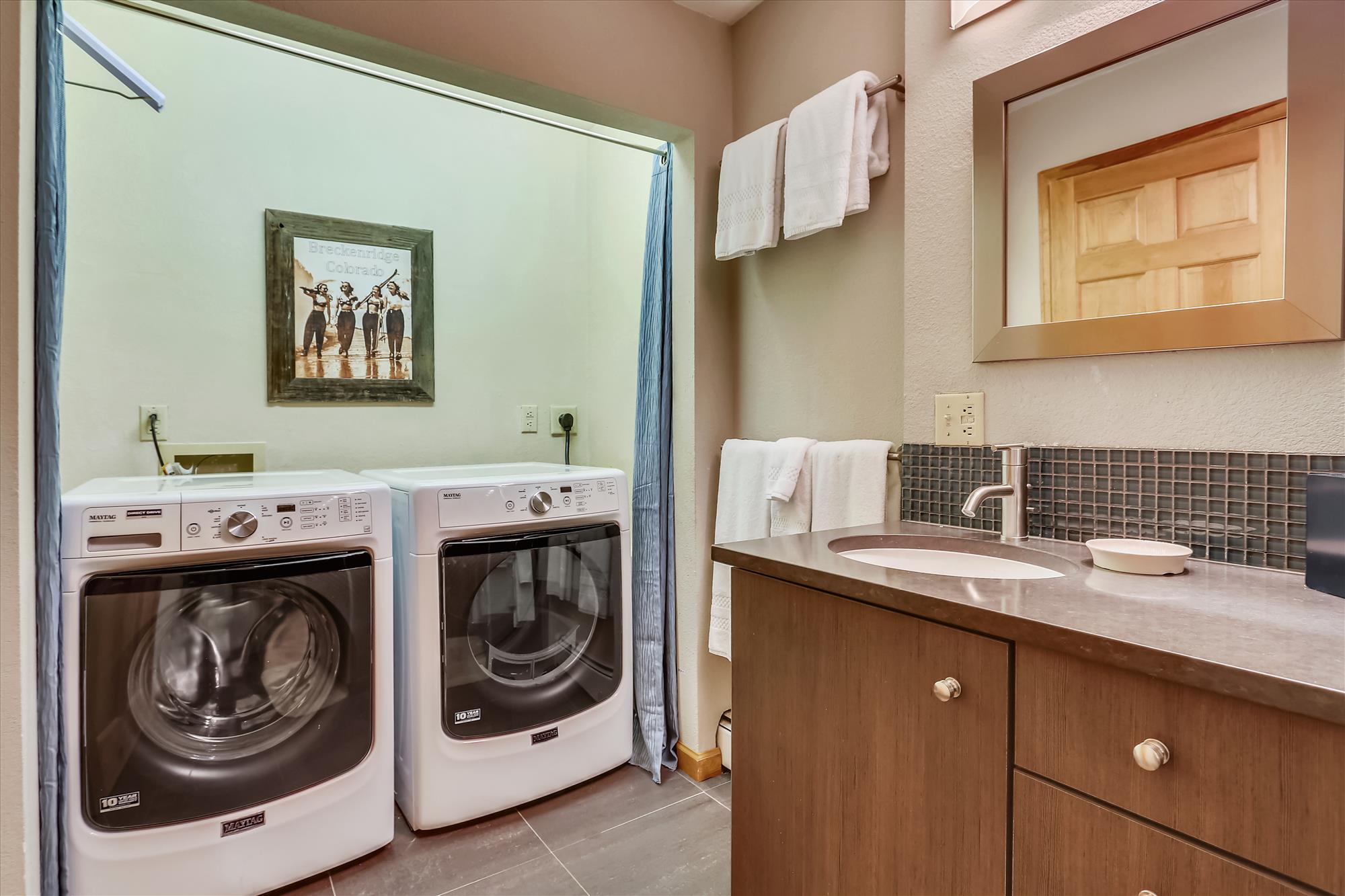 Lower level laundry with front load washer & dryer - 10 Southface Breckenridge Vacation Rental