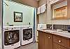 Lower level laundry with front load washer & dryer - 10 Southface Breckenridge Vacation Rental