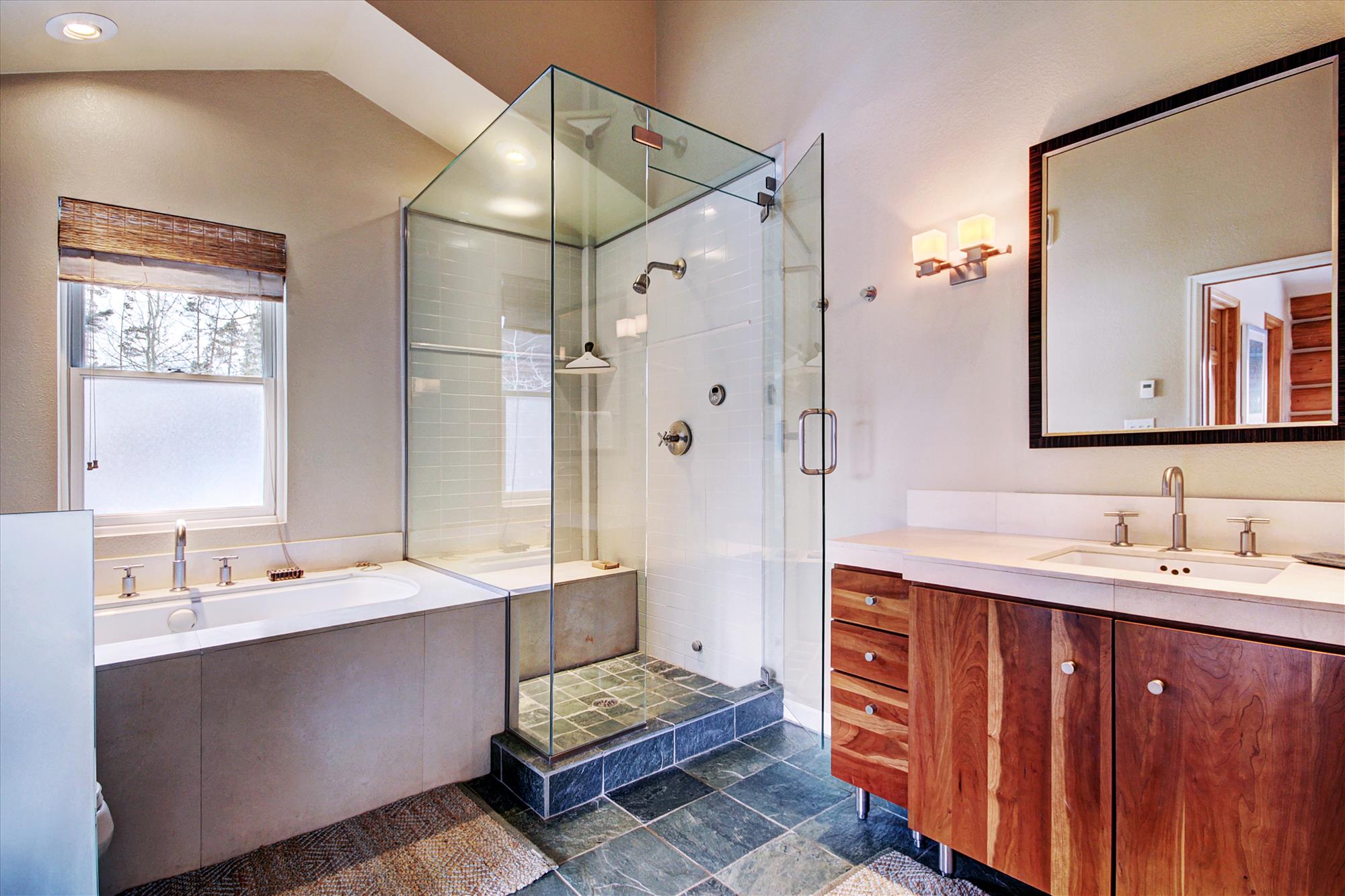 Main level master private bath with walk-in steam shower, bathtub and 1 sink - 10 Southface Breckenridge Vacation Rental