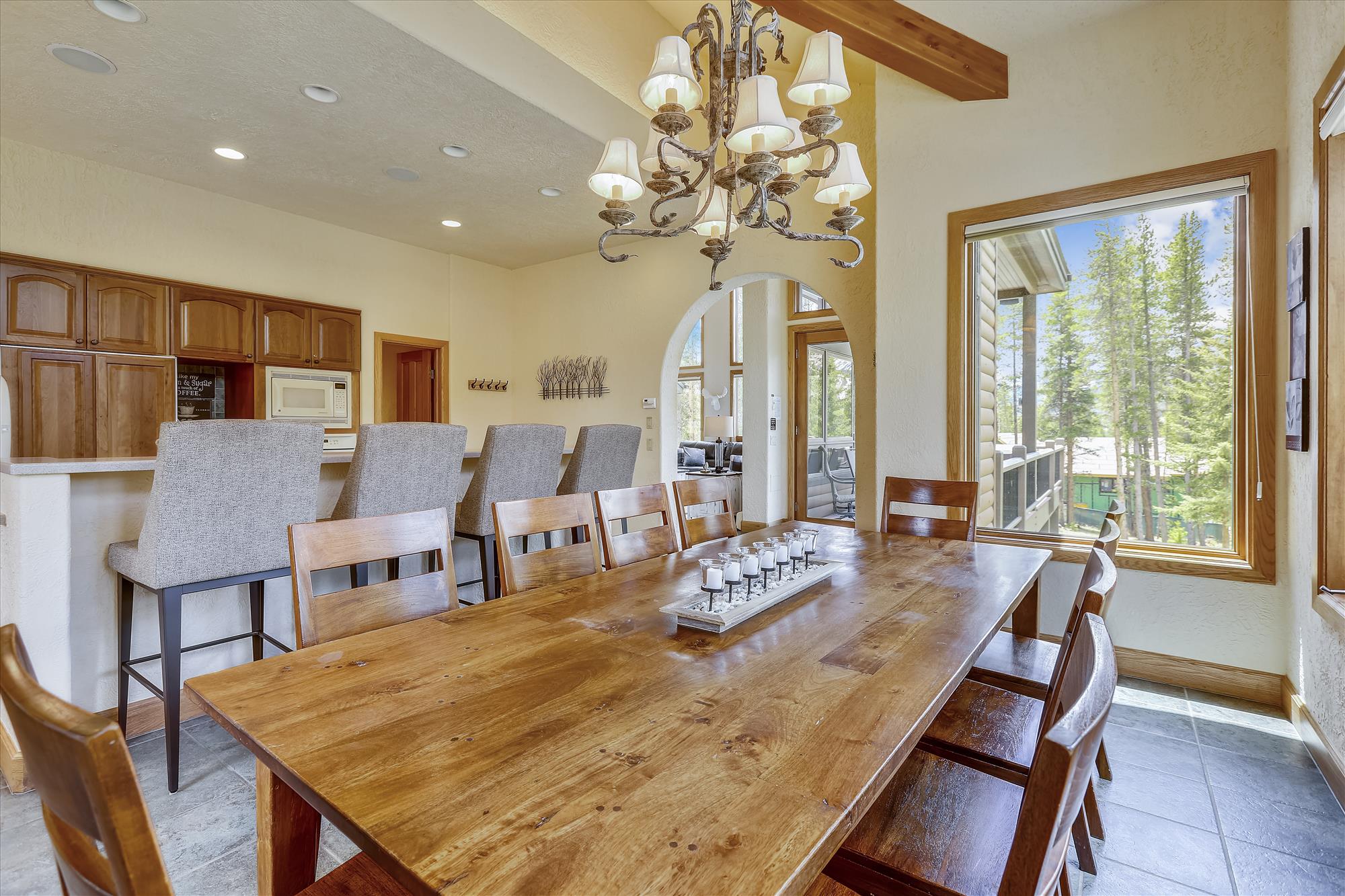 Dining room with 10 seating spaces and 4 additional spaces at the island bar - Evergreen Lodge Breckenridge Vacation Rental