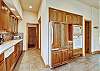 This spacious kitchen offers all of the storage space and walking room to host a large party - Evergreen Lodge Breckenridge Vacation Rental 