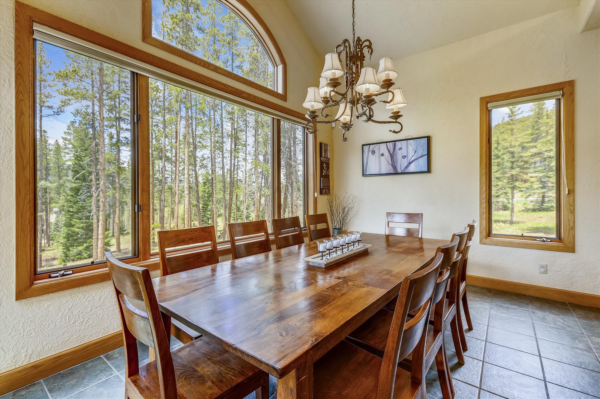 Enjoy a family dinner with gorgeous views from the dining room - Evergreen Lodge Breckenridge Vacation Rental