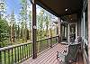 Sit in the warm sun on a summer day and enjoy the views from this large patio - Evergreen Lodge Breckenridge Vacation Rental 