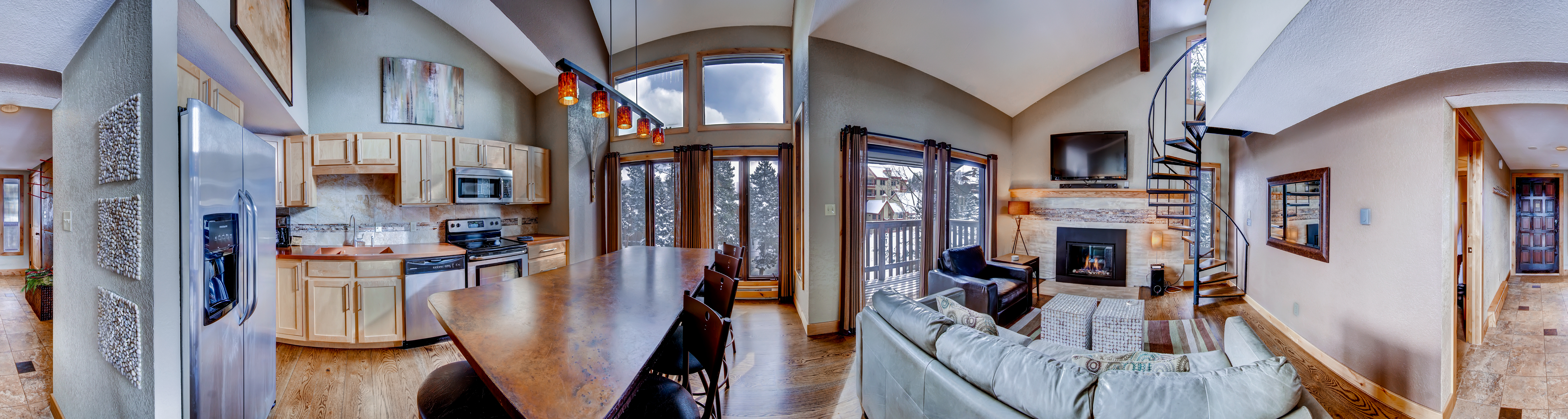 Panoramic view of the kitchen and living areas - 4 O’Clock Lodge A16 Breckenridge Vacation Rental