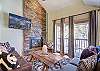 Relax by the gas fireplace after a long day on the slopes - 4 O’Clock Lodge D26 Breckenridge Vacation Rental 