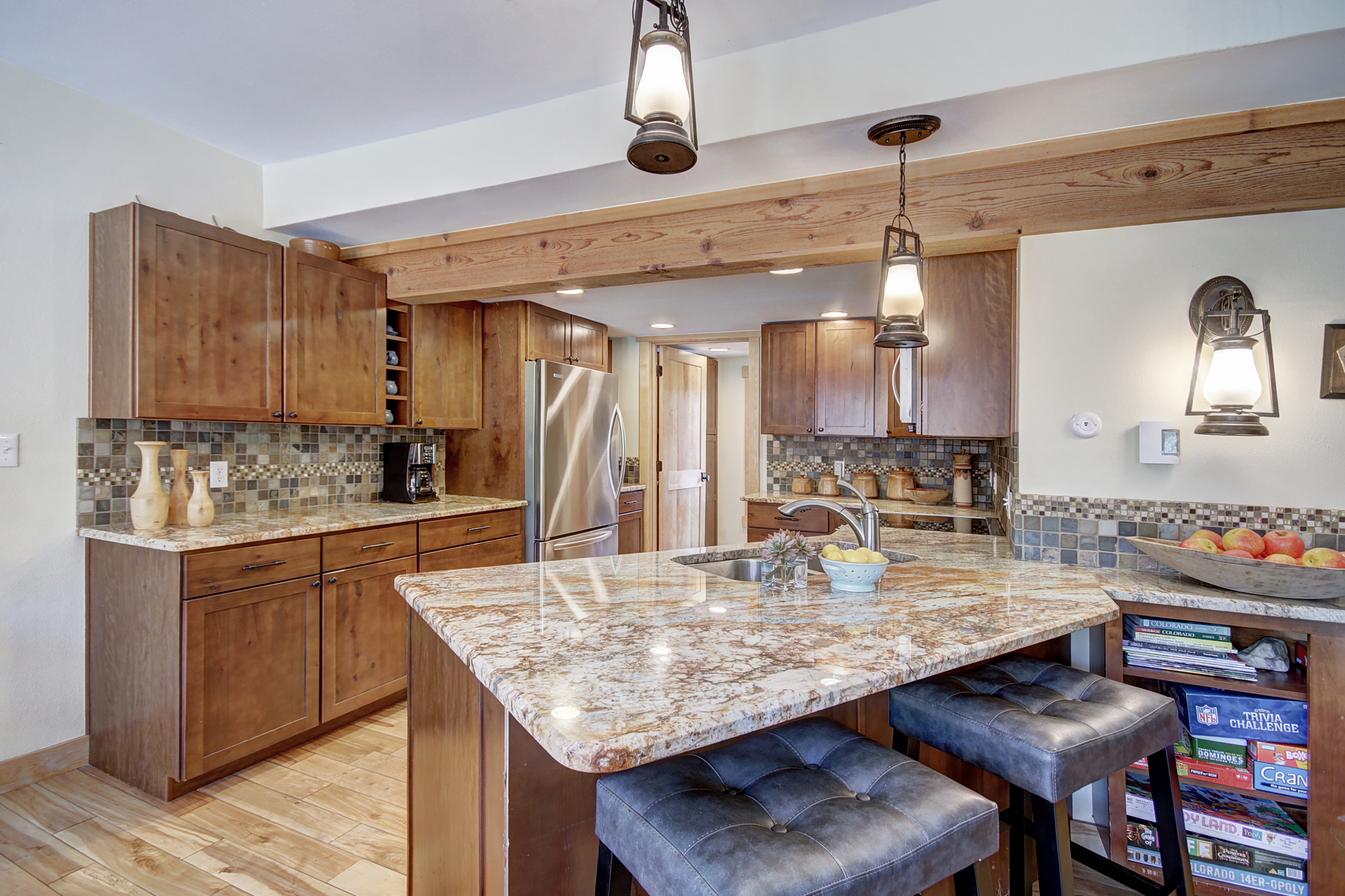 Enjoy cooking meals in the updated kitchen with stainless steel appliances - 4 O’Clock Lodge D26 Breckenridge Vacation Rental
