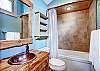 Hallway bathroom utilized by the King bedroom and loft beds - 4 O’Clock Lodge D26 Breckenridge Vacation Rental 