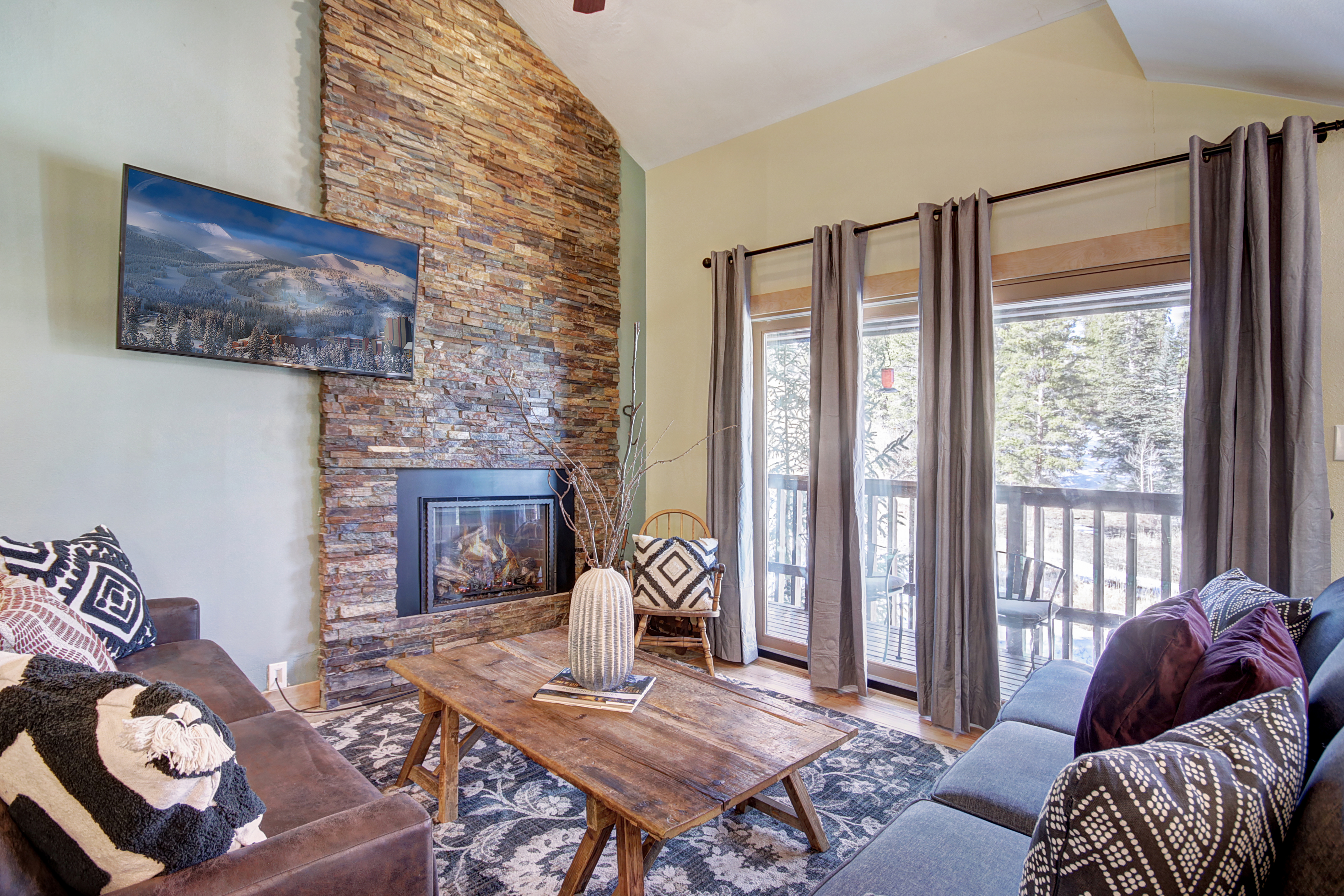 Relax by the gas fireplace after a long day on the slopes - 4 O’Clock Lodge D26 Breckenridge Vacation Rental