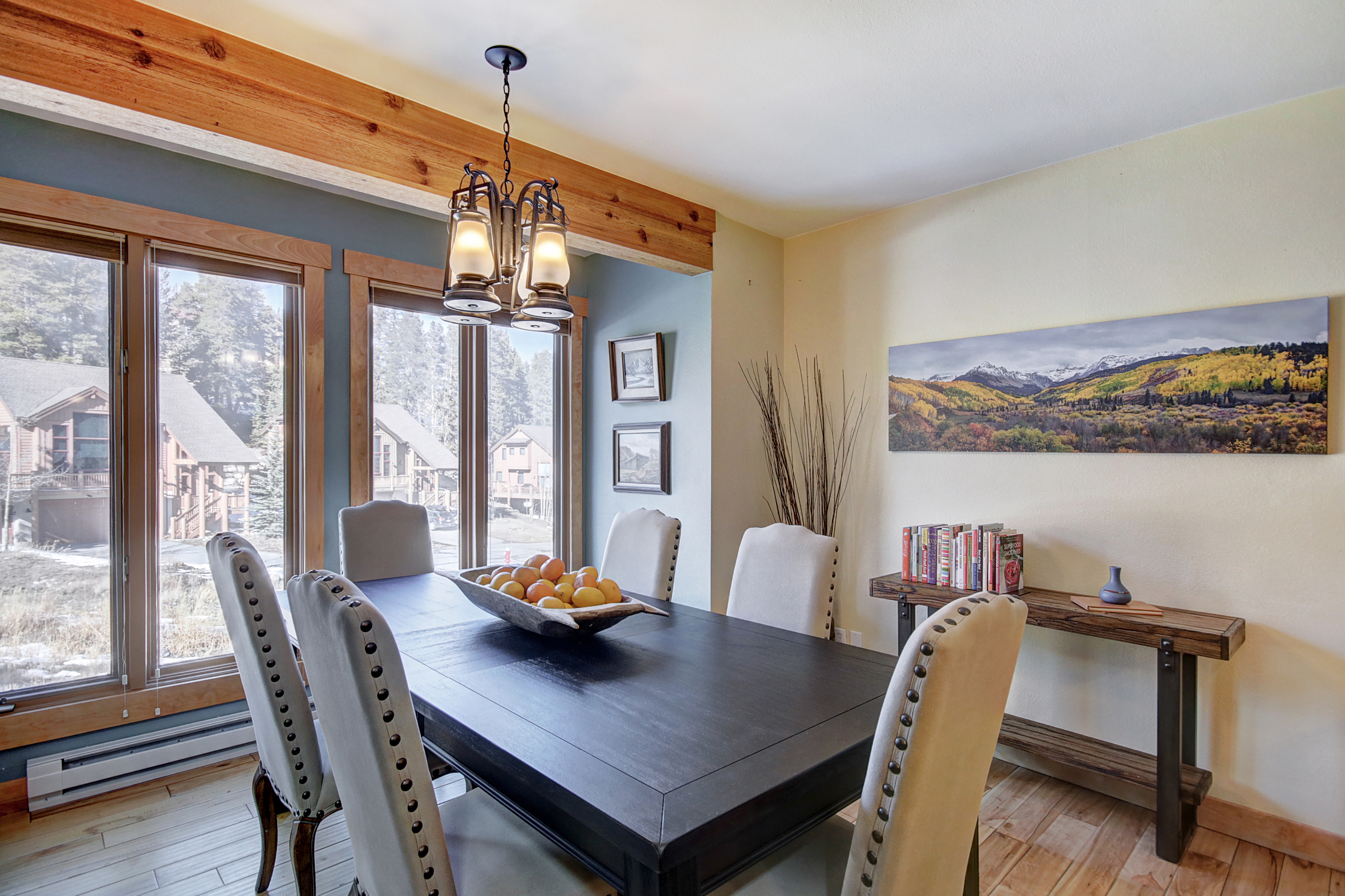 Watch the snow fall as you enjoy a meal at the dining table that can seat 10 - 4 O’Clock Lodge D26 Breckenridge Vacation Rental
