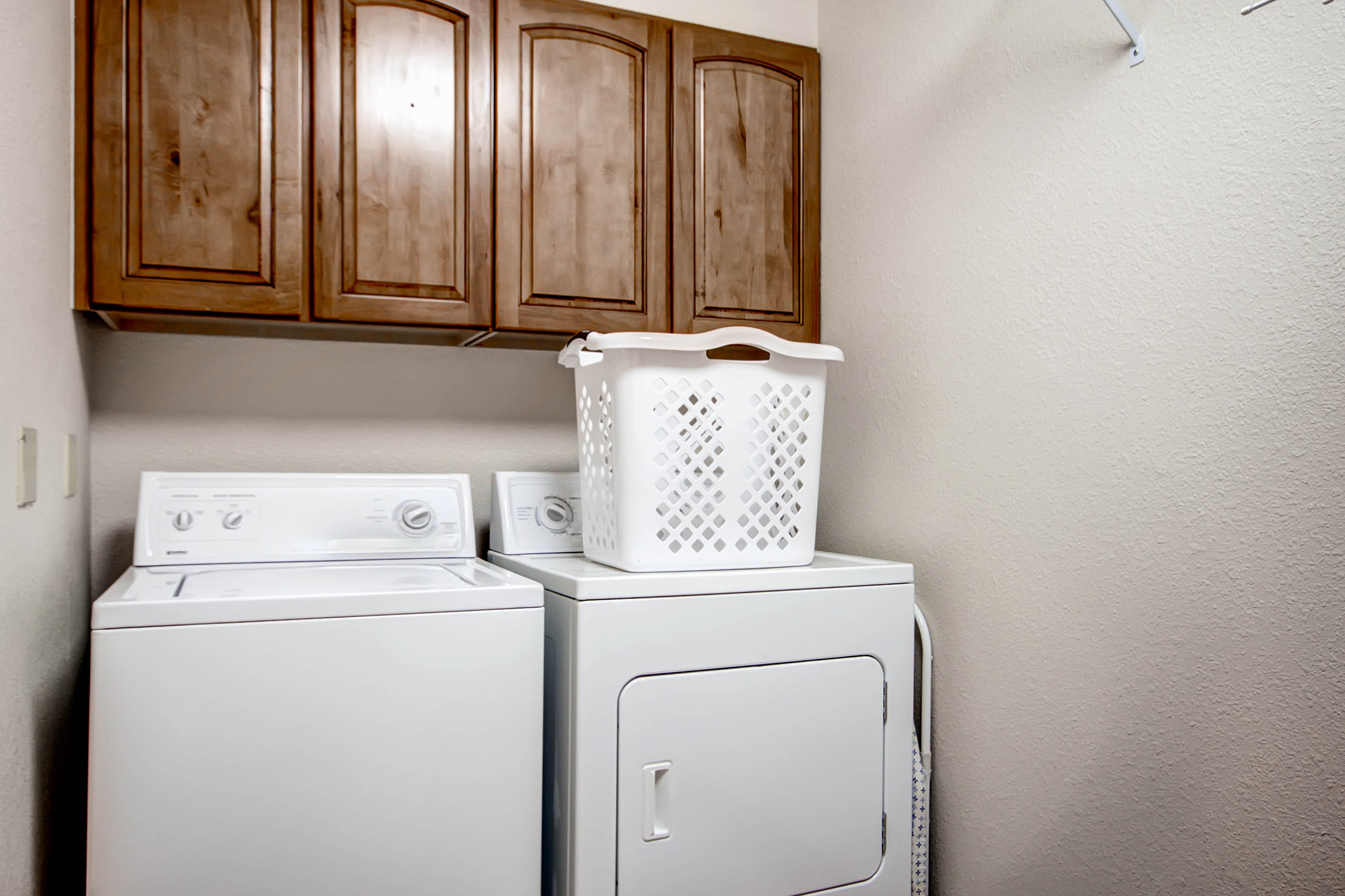 Laundry room on the bottom floor offers full size washer and dryer as well as hanging racks for wet clothes - Amber Sky Breckenridge Vacation Rental