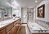 Relax in a bubble bath in this large master bathroom - Amber Sky Breckenridge Vacation Rental 