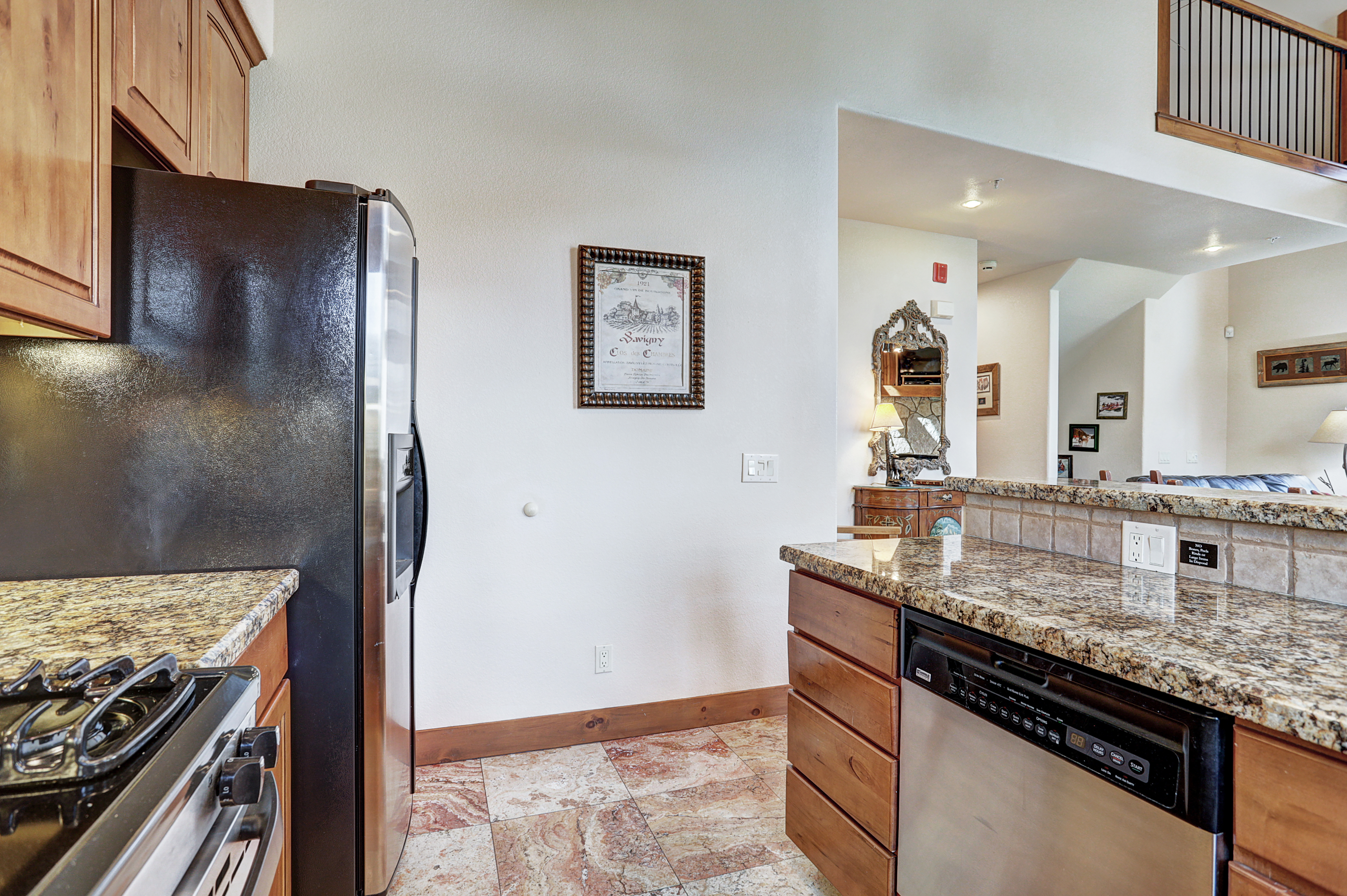 Store all of the food and stacks you need in this large stainless steel fridge - Amber Sky Breckenridge Vacation Rental