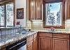 Enjoy the beautiful views right outside the kitchen - Amber Sky Breckenridge Vacation Rental 