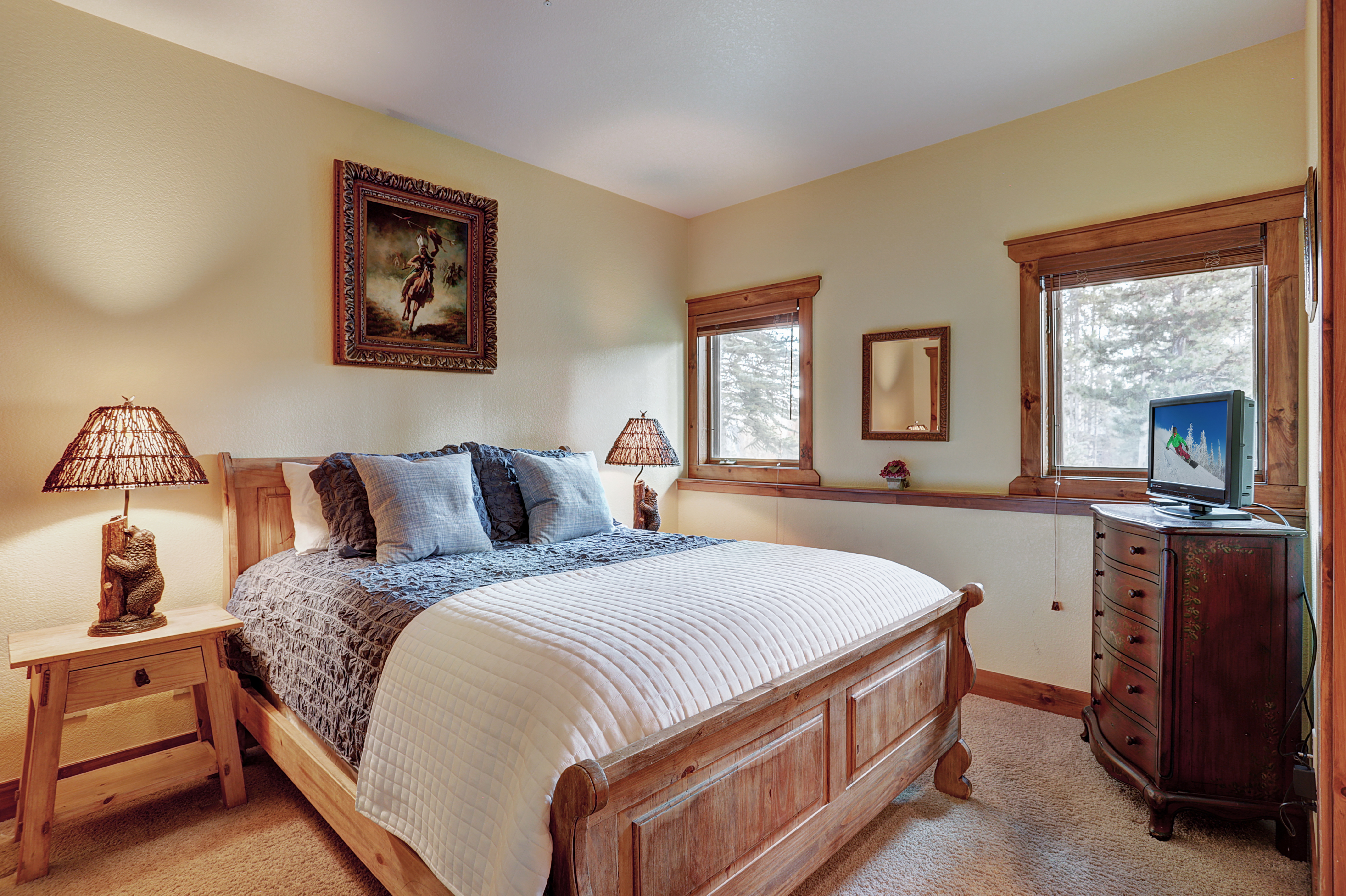 Lower level queen bedroom with TV and private bathroom - Amber Sky Breckenridge Vacation Rental