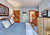 This queen bedroom offers a spacious closet and private bathroom - Amber Sky Breckenridge Vacation Rental 