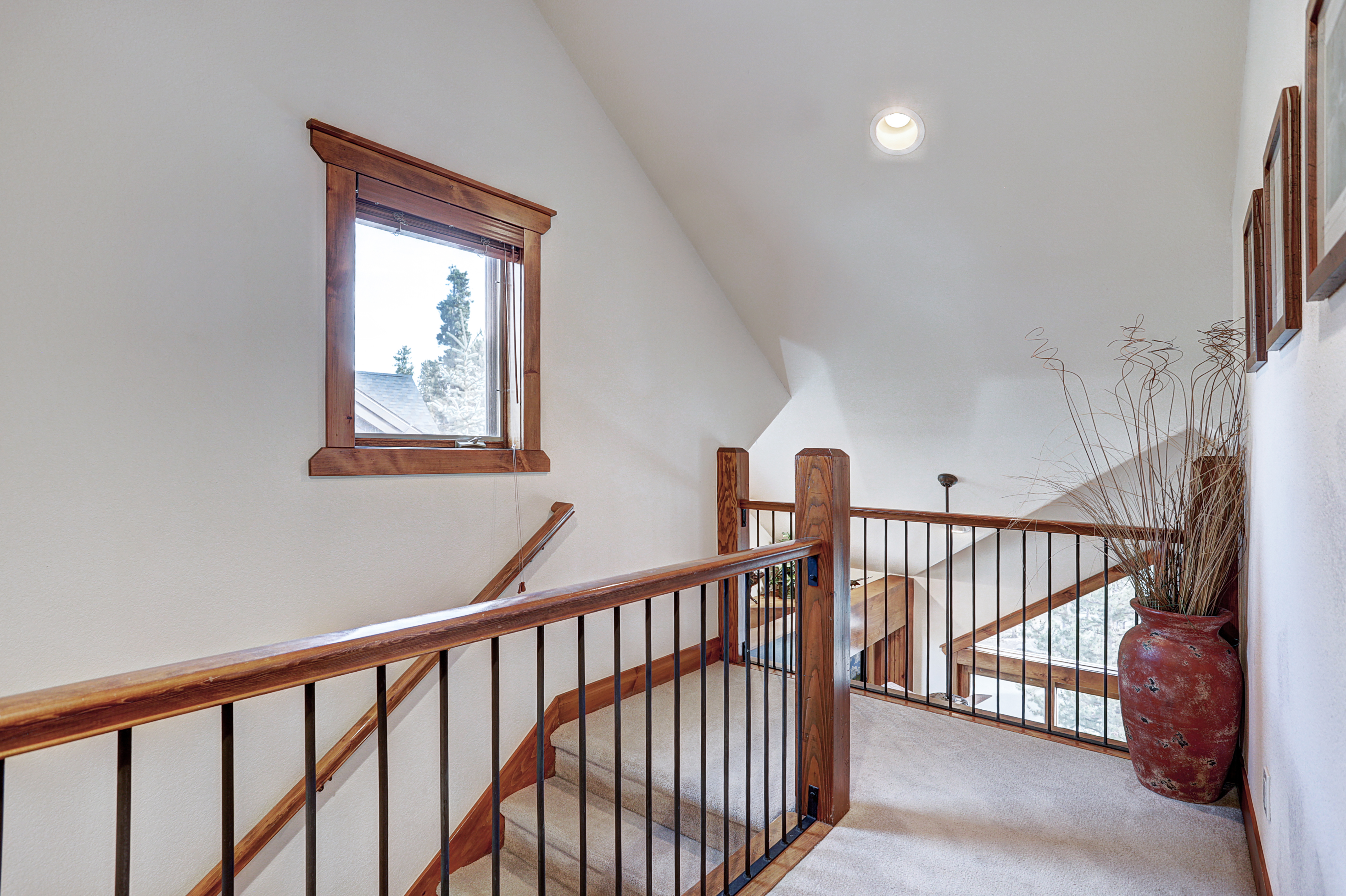 Upper level landing overlooking the living space downstairs - Amber Sky Breckenridge Vacation Rental